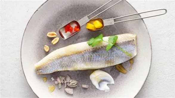 Śledzie w śmietanie